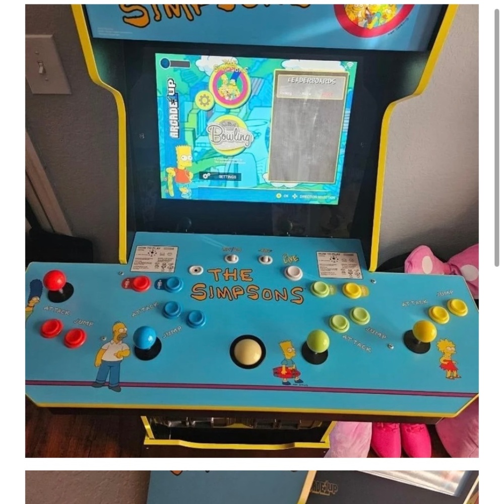 One up arcade simpsons machine